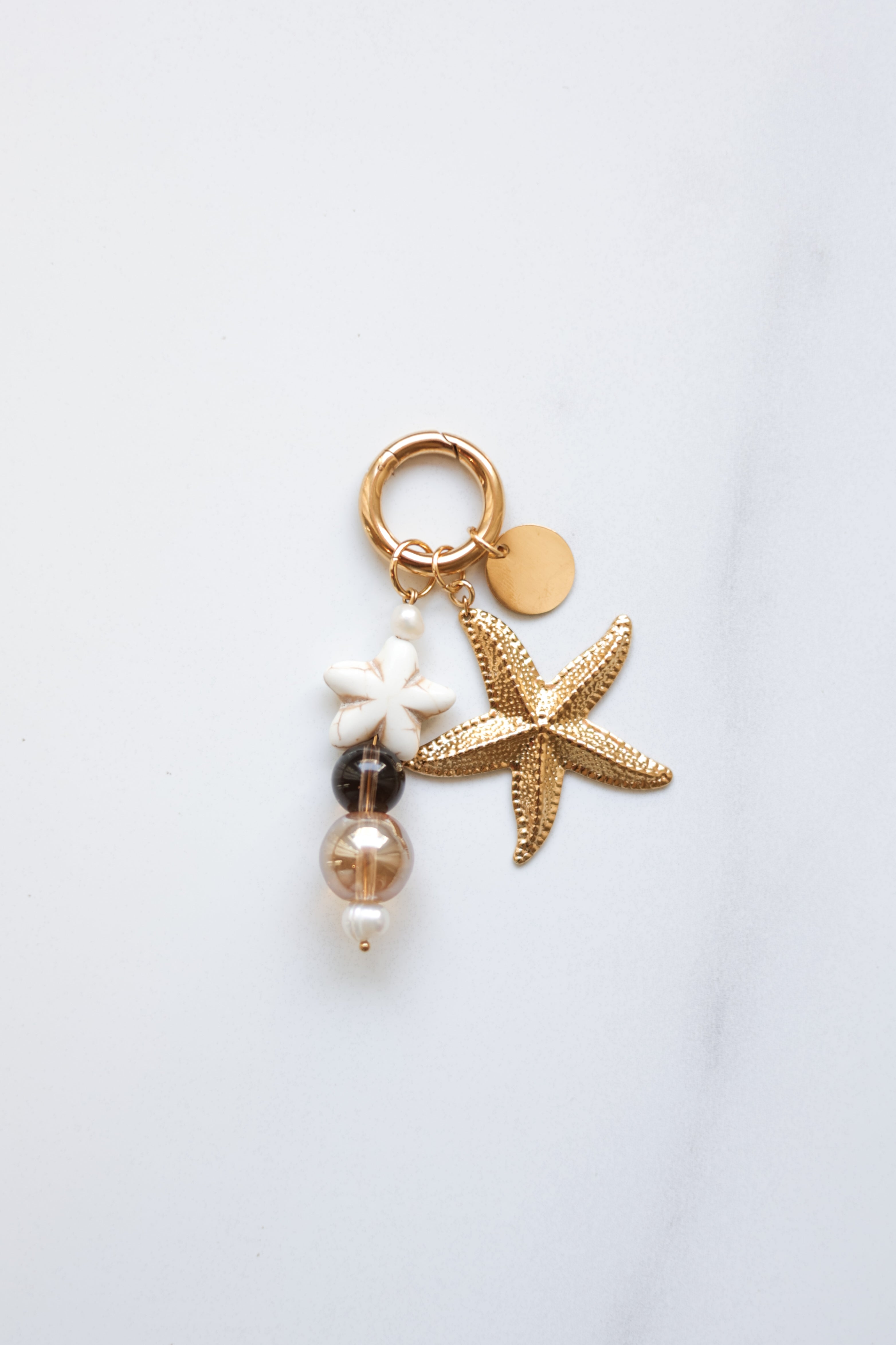 Golden bag charms